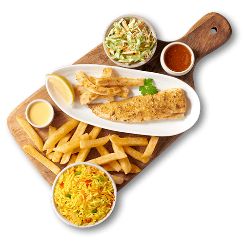 Hake fillets with chips, pop prawns and rice on a wooden board