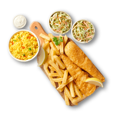 Two small servings of hake with a portion of large chips next to two bowls of coleslaw and one bowl of onion rings.
