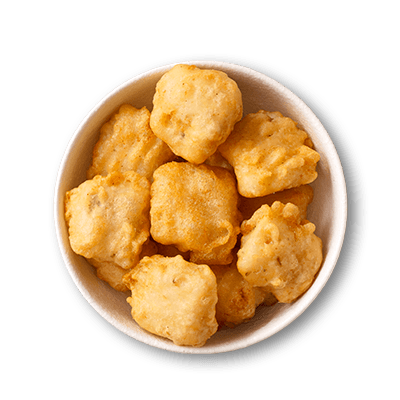 Hake nuggets in a white bowl