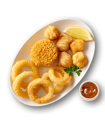 Fried seafood platter with crispy squid rings, fish bites, breaded crab cake, lemon wedge, and dipping sauce.