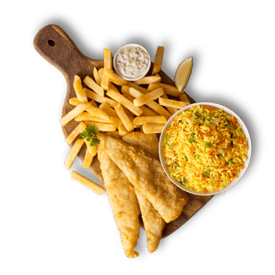 Golden fried fish fillets served with French fries, savory yellow rice, tartar sauce, and a lemon wedge on a wooden board.