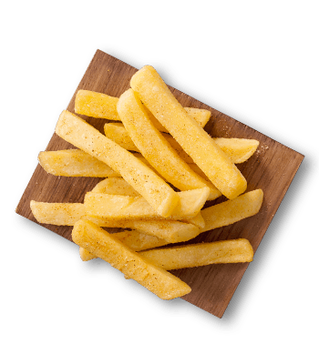Crispy fried potato chips on a wooden board