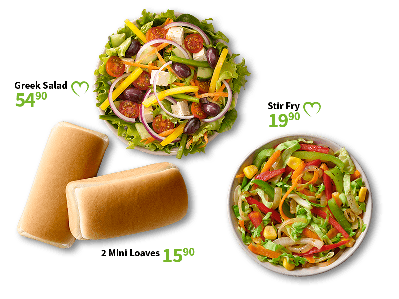 Fresh green salad with feta cheese, tomatoes, olives, and bell peppers; a bowl of stir fry; and two soft bread rolls.