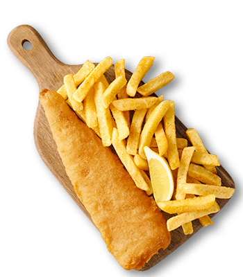 Crispy golden battered fish fillet served with chips and a lemon wedge on a wooden board.