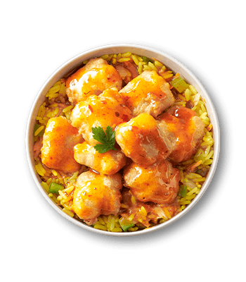 Golden glazed hake bites with a vibrant orange sauce, served over fragrant yellow rice mixed with green vegetables
