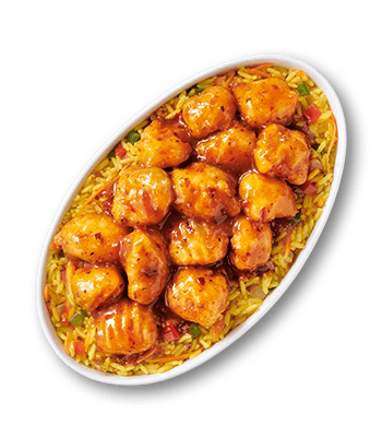 Hake nuggets on top of a serving of rice in a white bowl.