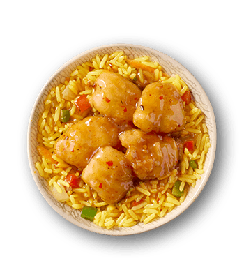 Golden glazed hake bites with a vibrant orange sauce, served over fragrant yellow rice mixed with green vegetables