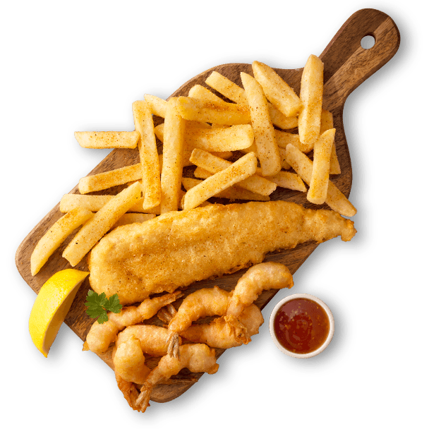 Hake fillets with chips, pop prawns and rice on a wooden board