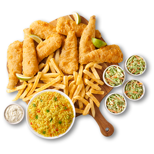 Hake fillets with chips and rice on a wooden board