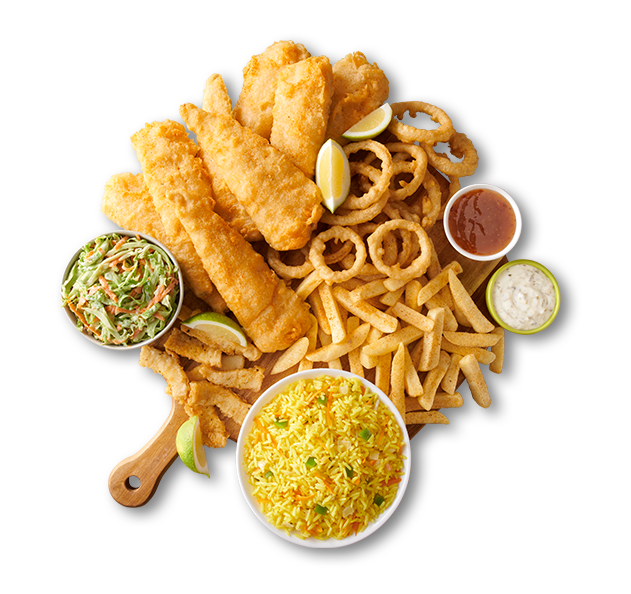 Hake fillet with chips and rice on a wooden board